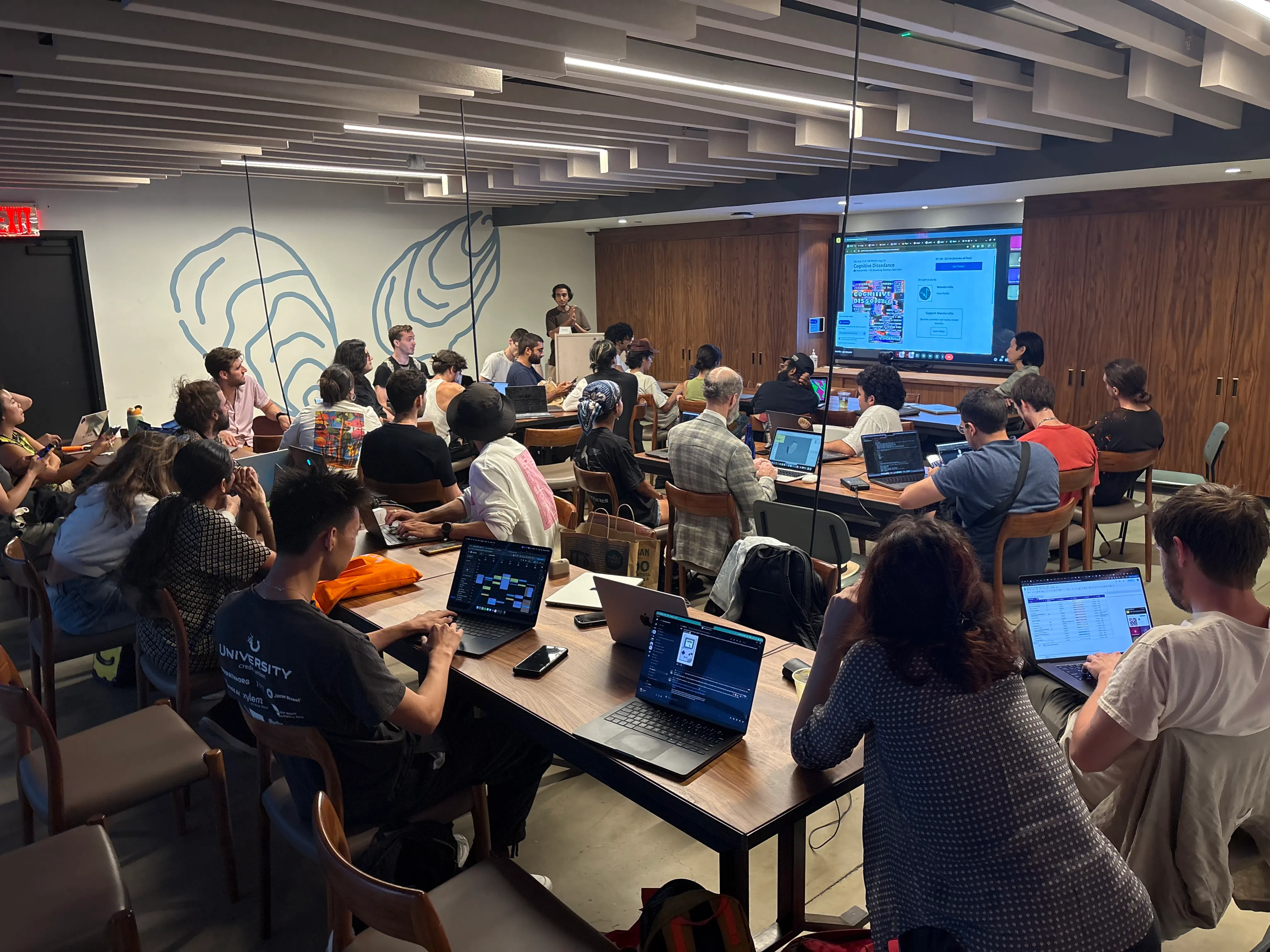 A bunch of people with laptops in a large room (CCNYC meetup)